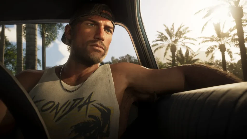 GTA 6 Details Have Fans Even More Excited After New Dazed Magazine Report GTA 6 character Jason relaxing in car during sunset with palm trees in background