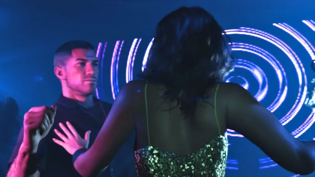 GTA 6 Extended Look Has Fans Amazed by Rockstar’s Insane Hair Physics Jason and Lucia dancing in a neon-lit nightclub in GTA 6 Trailer 2, with glowing visuals and club atmosphere.