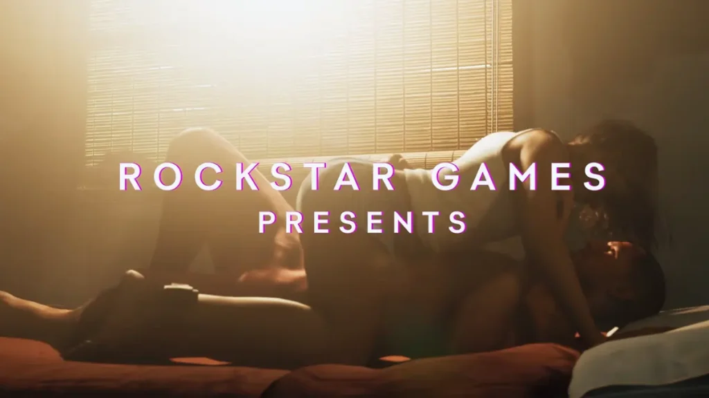 Jason and Lucia intimate moment on bed in GTA 6 Trailer 2 with Rockstar Games Presents text.