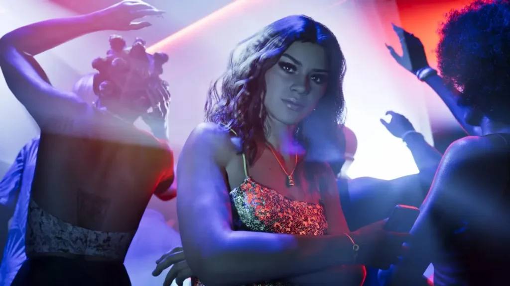 Lucia in nightclub surrounded by dancers and neon lights in GTA 6
