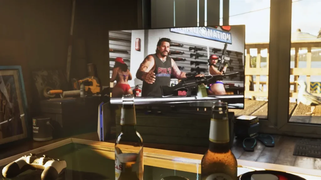 GTA 6 Fans Reminded Why Rockstar Refuses to Cast Hollywood Stars, as Sam Houser's Comments Resurface TV displaying Phil’s Ammu-Nation commercial with rifles and bikini-clad women, surrounded by beers and a game controller in a Vice City cabin scene from GTA 6 Trailer 2