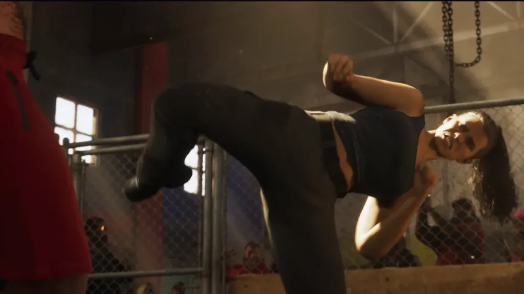 Lucia, the protagonist of GTA 6, throwing a powerful kick during an underground fight scene from Trailer 2, set in a gritty cage-fighting arena