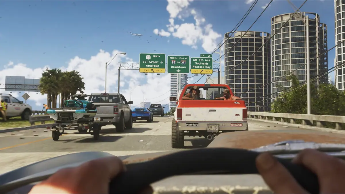 Screenshot from GTA 6 Trailer 2 showing a highway scene with vehicles and city skyline in the background.