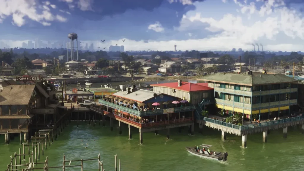 GTA 6 waterfront city scene featuring colorful buildings, pier restaurants, and boats – official Rockstar Games artwork
