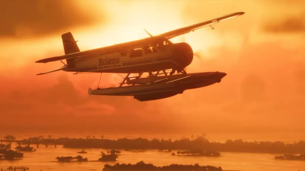 A new GTA 6 screenshot shows Brian Heder's floatplane flying over the Grassrivers at sunset. The image highlights Leonida's wetlands, with warm sunset lighting reflecting across the water and showcasing the game's detailed environment. The aircraft features branding for Brian's Boat Works & Marina, offering another glimpse into the world of GTA 6.